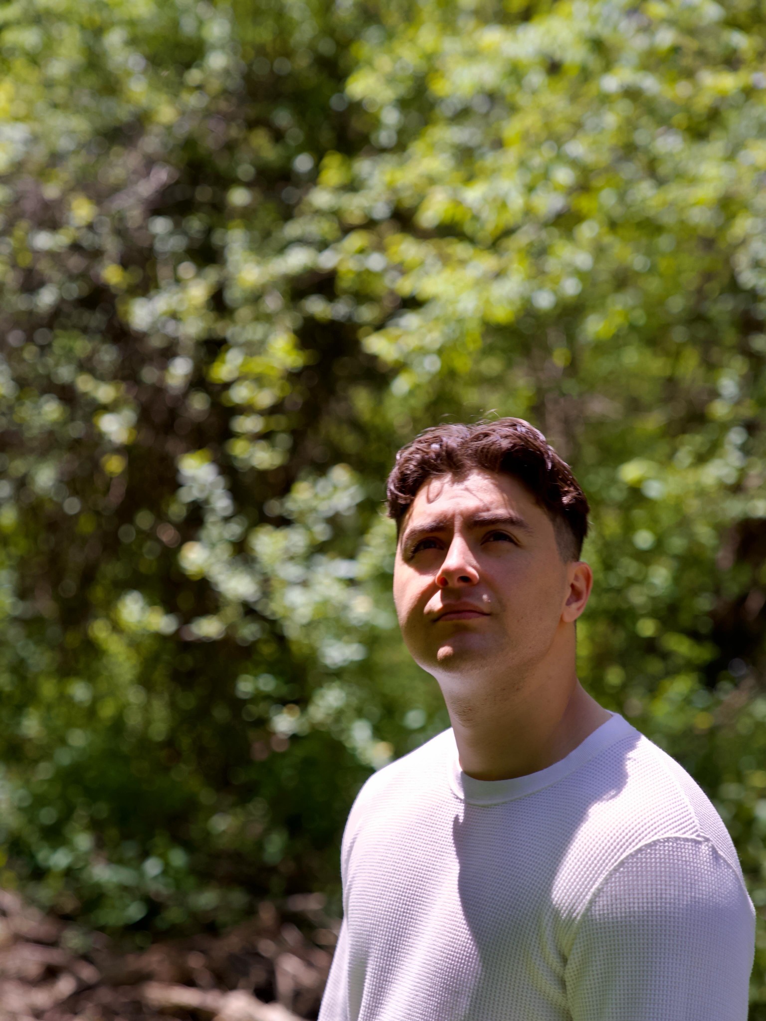 Nicholas Petrungaro outdoors in a white shirt